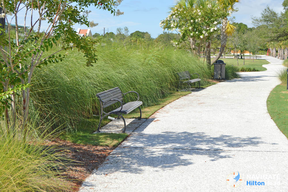 Benches along the Walking path at the edge of Broad Creek at the Shelter Cove Community Park in Hilton Head 1000
